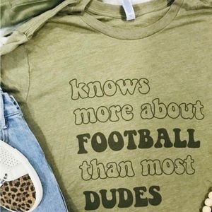 Knows more than football than most dudes tee